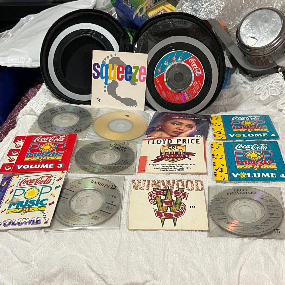 Black Portable Minidisc Player with Round Carry Case and Discs